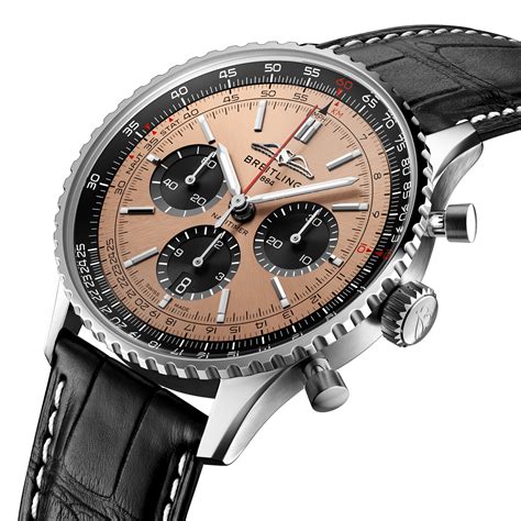 dials on a breitling watch|Breitling navitimer on wrist.